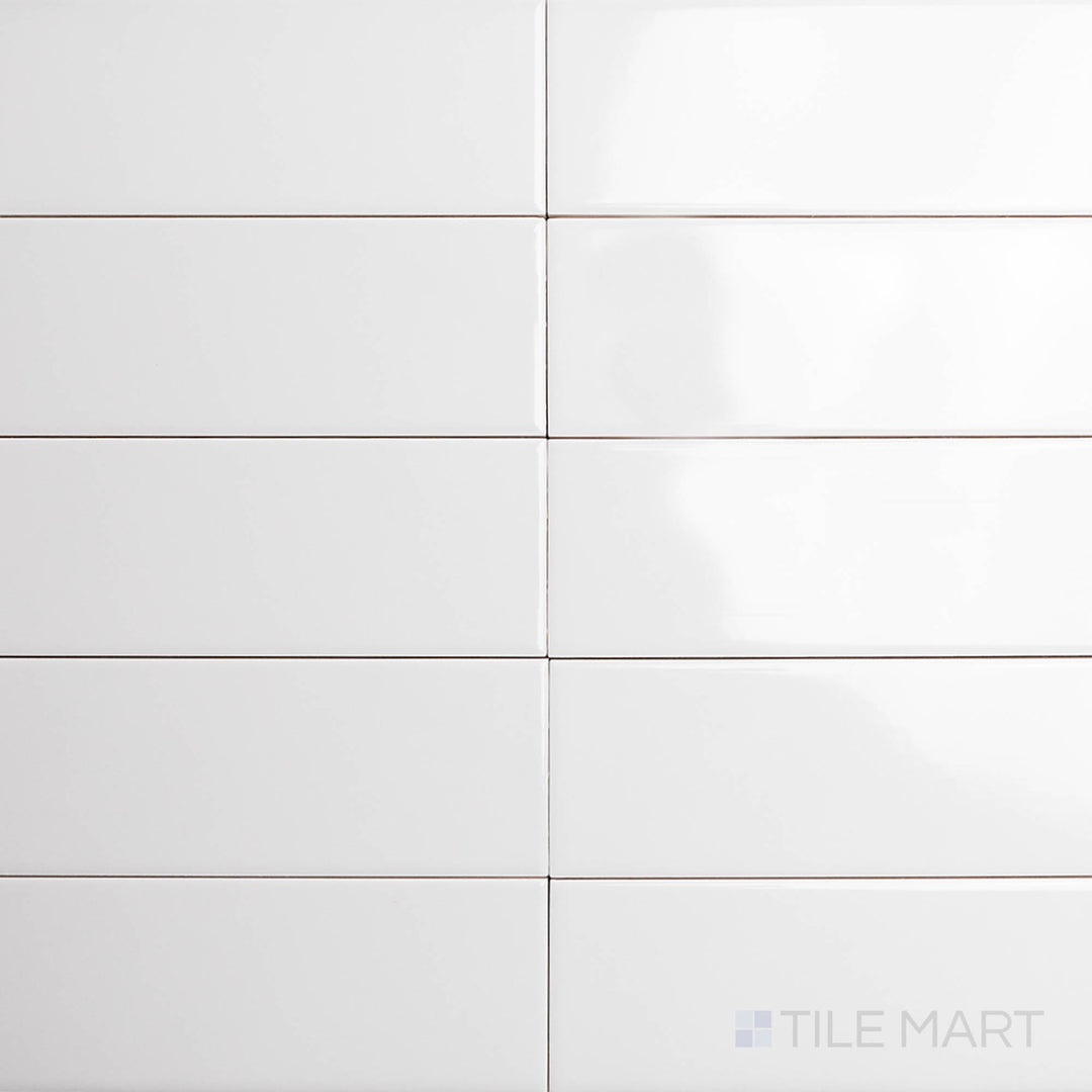 A top-down perspective of the Block Gris 2x10 inch bright ceramic tile showcases its elegant gray hue with a polished glaze, offering a refined and timeless appeal.