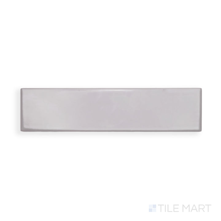 An intricate view of Block Acero 2X10 Bright Ceramic reveals its cool steel-inspired shade and high-gloss sheen, ideal for industrial and modern aesthetics.