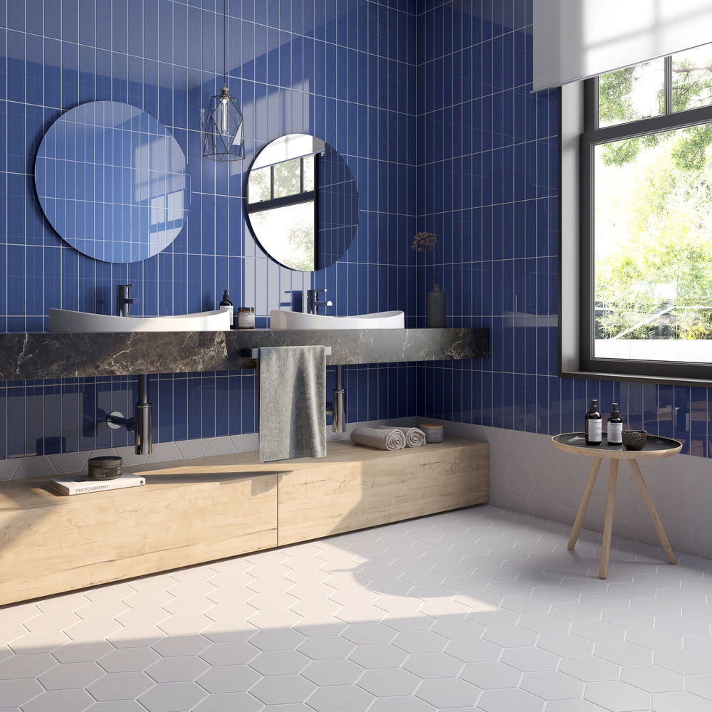 With a rich and vibrant tone, Block Azul 2X10 bright ceramic tile adds a striking pop of color for bold and refreshing interiors.