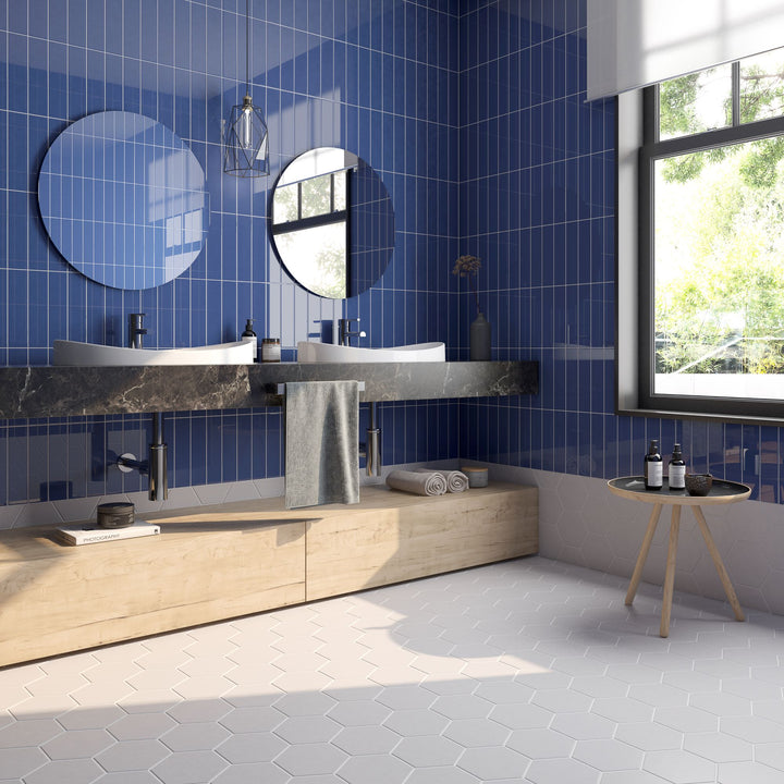 With a rich and vibrant tone, Block Azul 2X10 bright ceramic tile adds a striking pop of color for bold and refreshing interiors.
