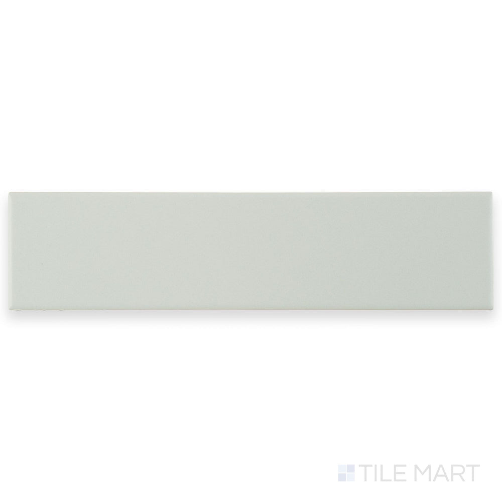 Flat lay of Block Blanco 2x10 matte ceramic tile in bright white, emphasizing its clean surface and narrow rectangular form.