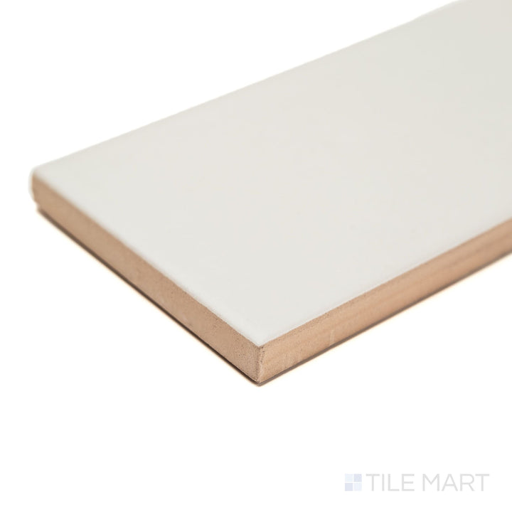 Angled corner shot of Block Gris 2x10 matte ceramic tile in contemporary gray, featuring a soft matte surface and precise rectangular profile—perfect for sleek interior wall designs.