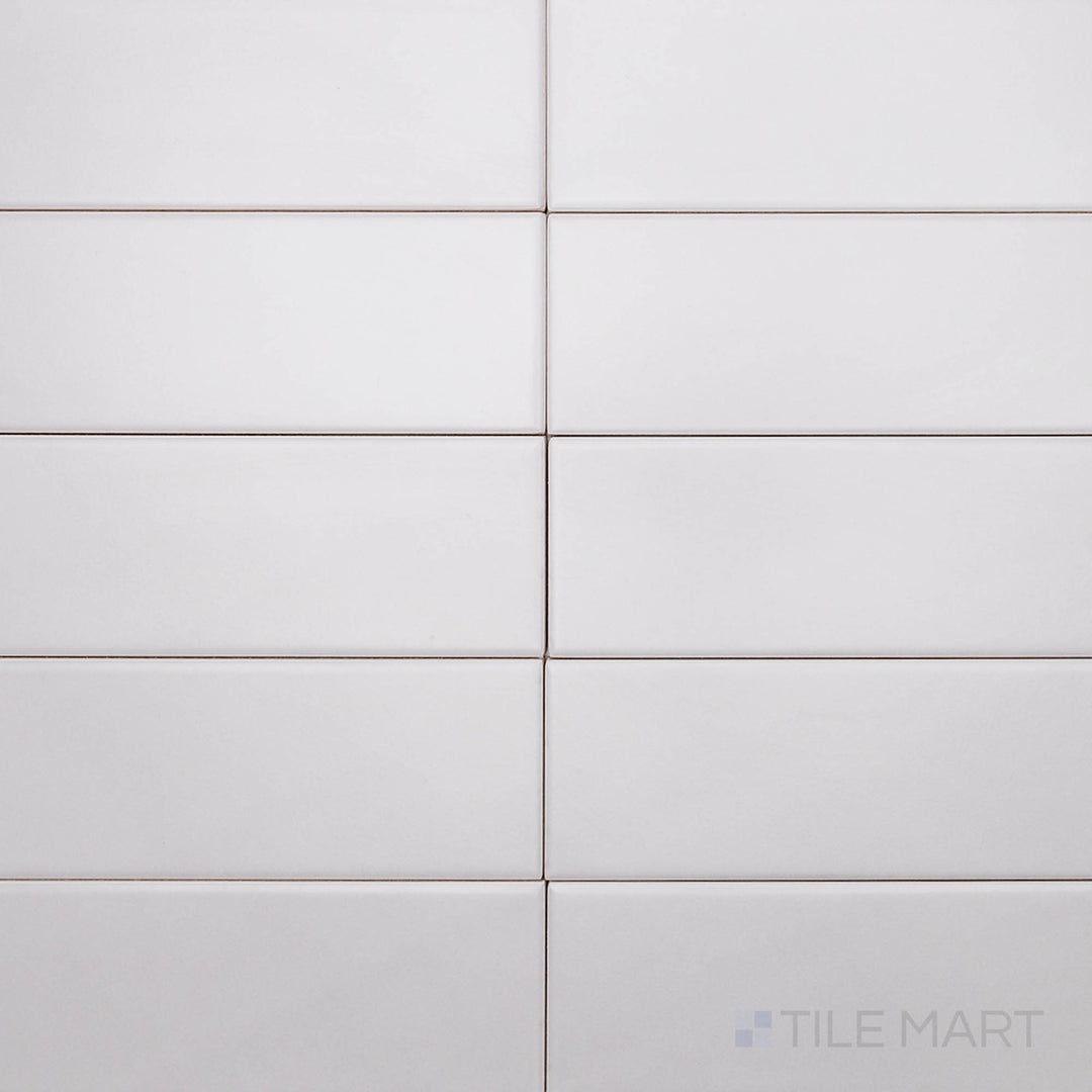 Seen from above, the Block Acero 2x10 inch matte ceramic tile presents a sophisticated steel-gray shade with a smooth, non-reflective finish for a sleek, industrial look.