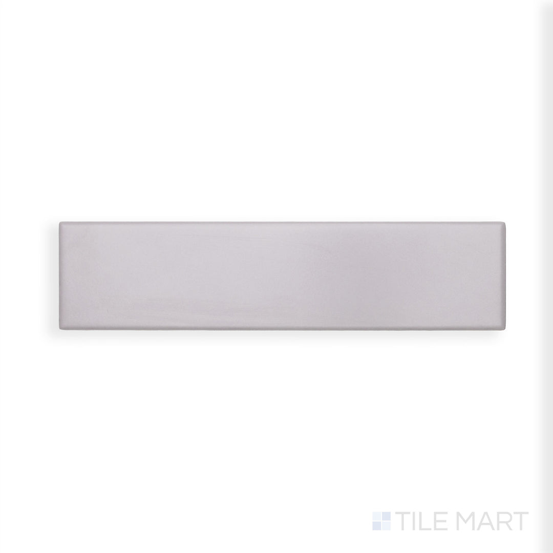 A refined close-up of Block Acero 2X10 Matte Ceramic displays its soft steel-gray tone and non-reflective surface, perfect for understated elegance.