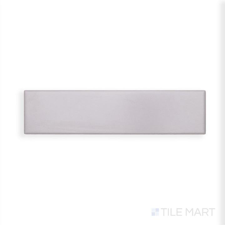 A refined close-up of Block Acero 2X10 Matte Ceramic displays its soft steel-gray tone and non-reflective surface, perfect for understated elegance.