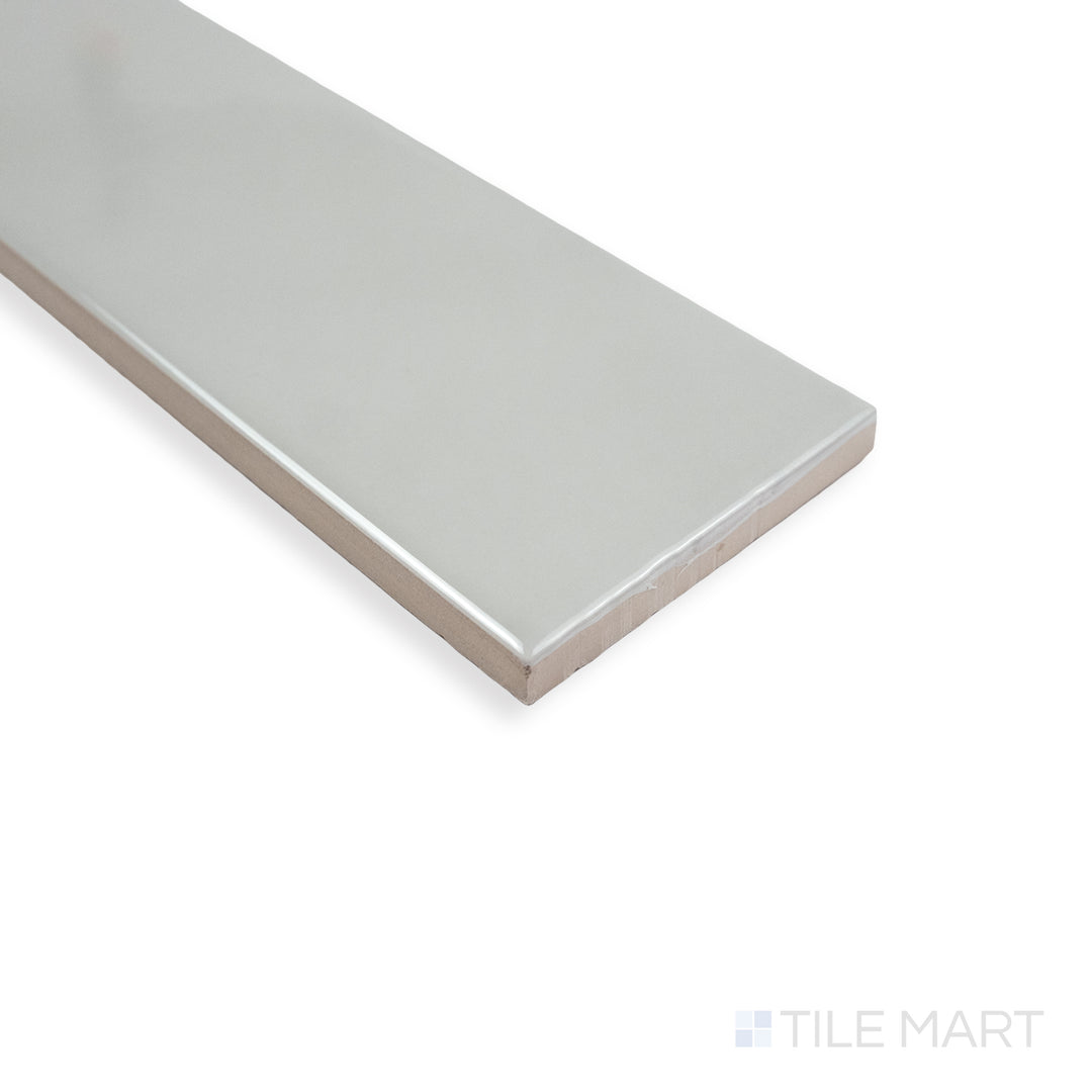 Side-angle shot of Block Acero 2X10 matte ceramic tile, showing its industrial steel-gray shade, non-glossy finish, and the meeting point at the corner.