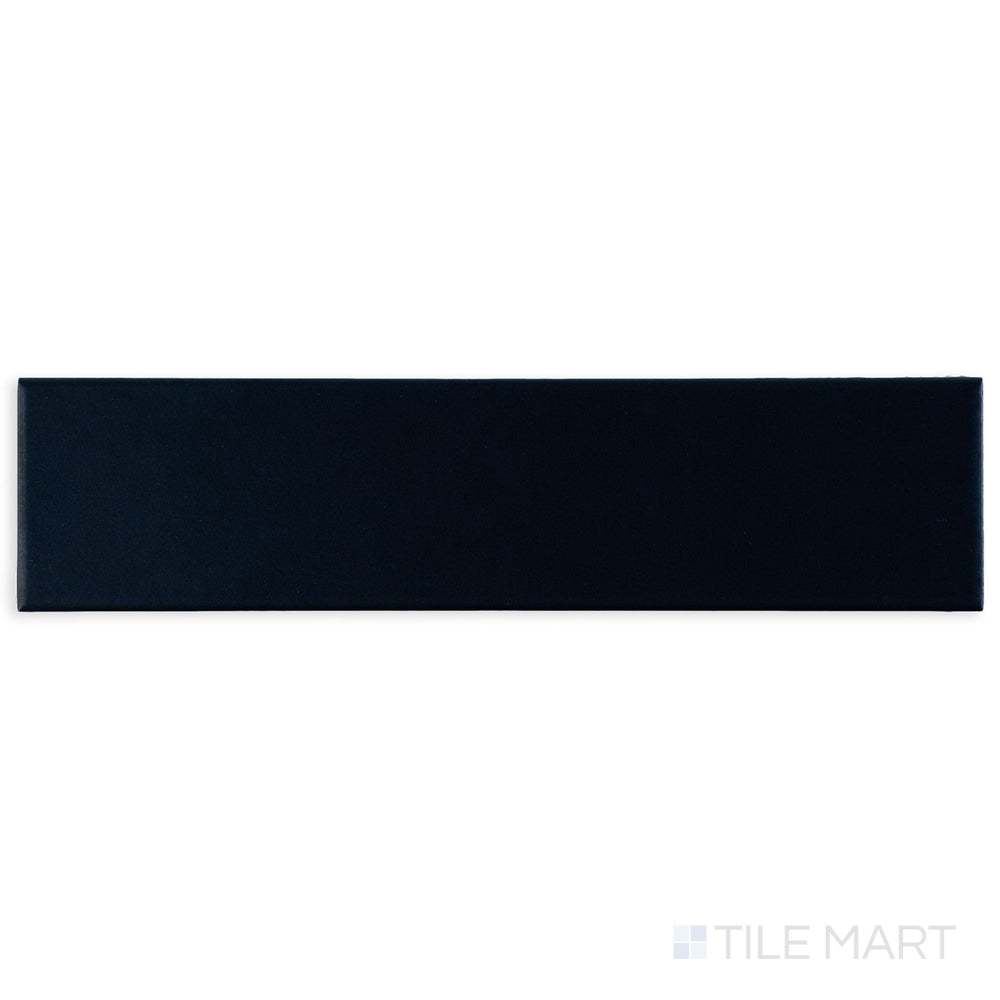 Photographed from a top angle, the Block Azul 2x10 matte ceramic tile reveals a rich blue tone with a modern matte texture.