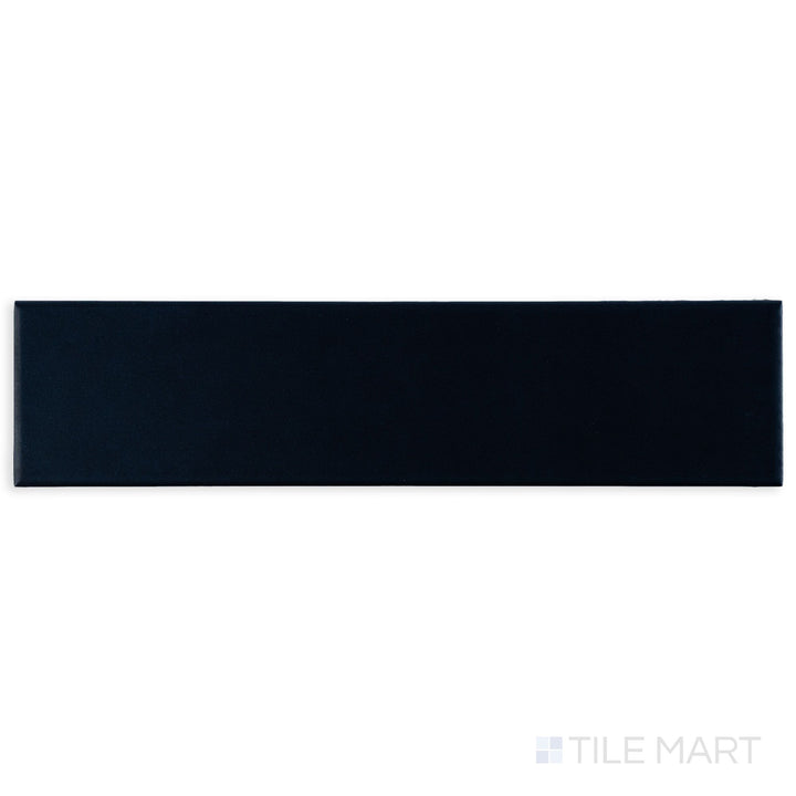 Photographed from a top angle, the Block Azul 2x10 matte ceramic tile reveals a rich blue tone with a modern matte texture.