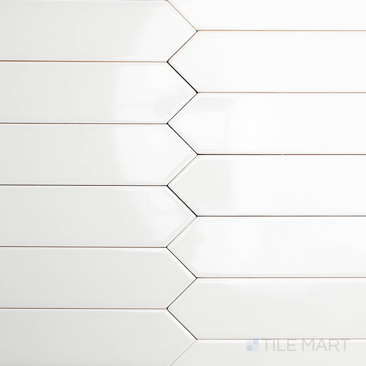 This bird’s-eye shot of the Block Gris 2x10 inch Arrow bright ceramic tile showcases its elegant gray shade with a glossy finish, arranged in a dynamic arrow pattern.