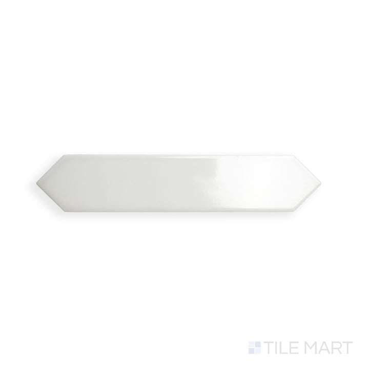 A close-up of Block Gris 2X10 Arrow Bright Ceramic showcases its directional arrow pattern with a smooth glossy finish, adding geometric elegance to walls.