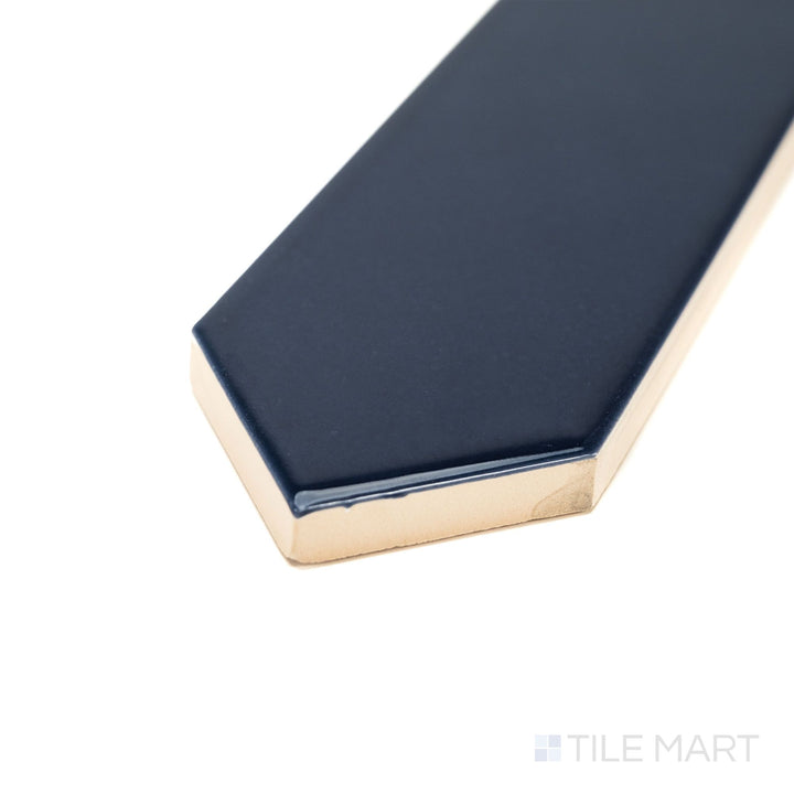 Block Azul 2x10 Arrow Bright ceramic tile shown from a corner view, featuring a vivid blue gloss and geometric arrow pattern—perfect for statement walls and backsplashes.