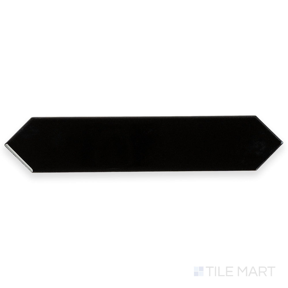 Overhead image of Block Negro 2x10 Arrow Bright ceramic tile in striking black, emphasizing its reflective surface and geometric arrow design.