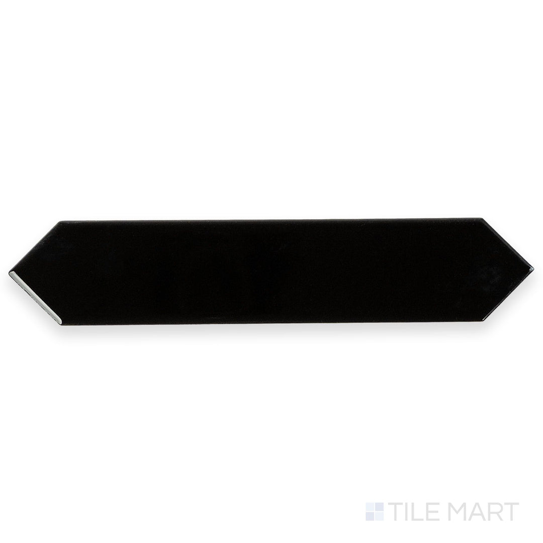 Overhead image of Block Negro 2x10 Arrow Bright ceramic tile in striking black, emphasizing its reflective surface and geometric arrow design.