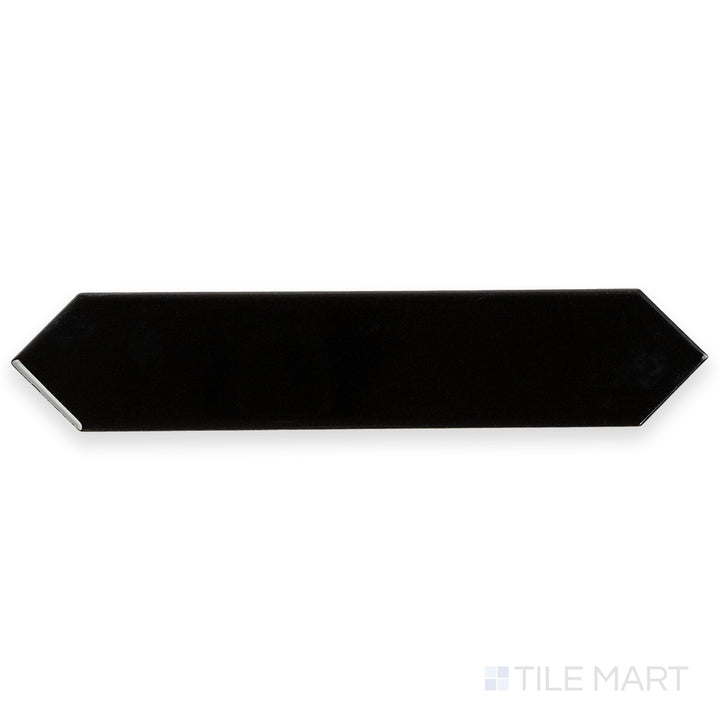 Overhead image of Block Negro 2x10 Arrow Bright ceramic tile in striking black, emphasizing its reflective surface and geometric arrow design.