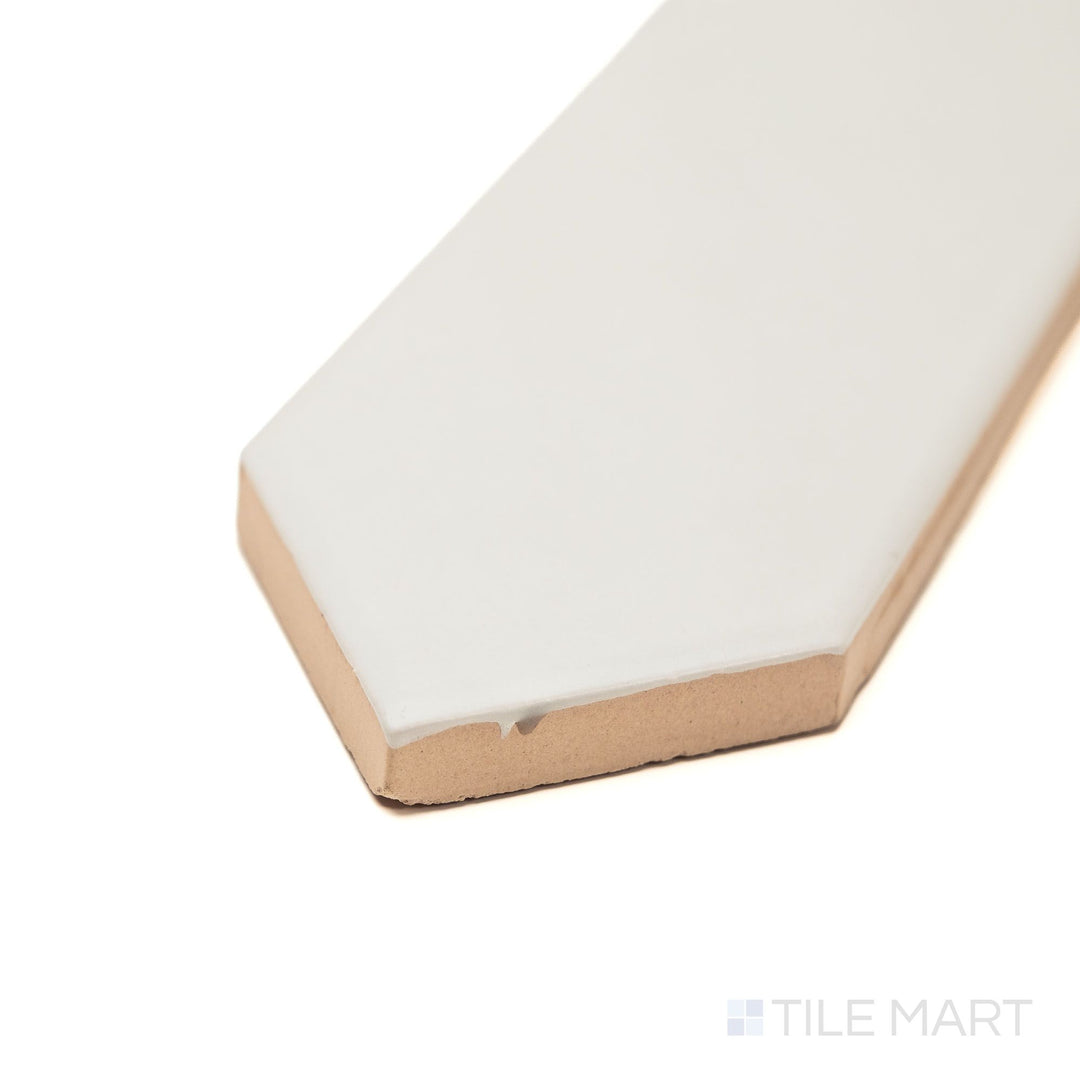 Corner view of Block Gris 2x10 Arrow Matte ceramic tile in neutral gray, emphasizing its textured arrow design and smooth matte glaze—ideal for minimalist or industrial-style interiors.