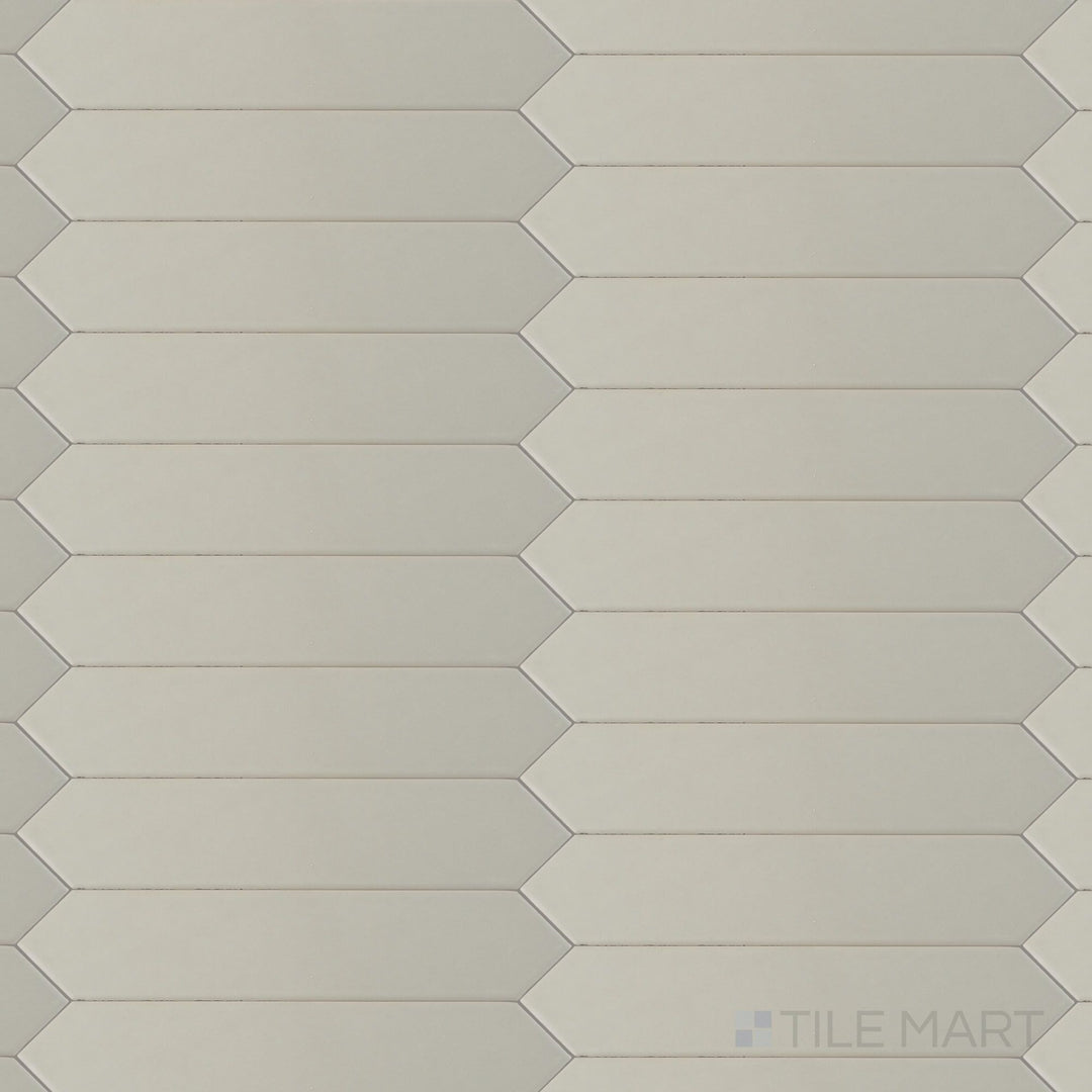 Overview image of Block Acero 2x10 Arrow Matte ceramic tile in a soft steel gray with a textured arrow design and a contemporary matte finish.