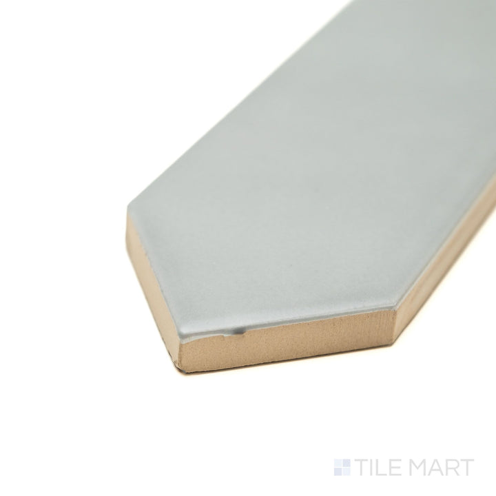 Block Acero 2x10 Arrow Matte ceramic tile shown at a corner angle, featuring a steel-gray tone, arrow-textured surface, and a soft matte finish—designed for modern wall applications.