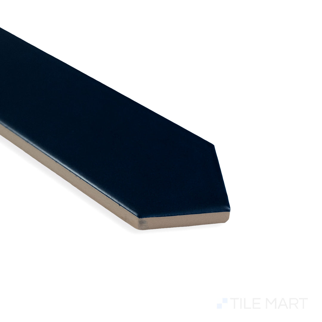 Corner shot of Block Azul 2X10 Arrow matte ceramic tile, featuring its rich blue shade, soft matte surface, and the dynamic arrow design meeting at the edge.