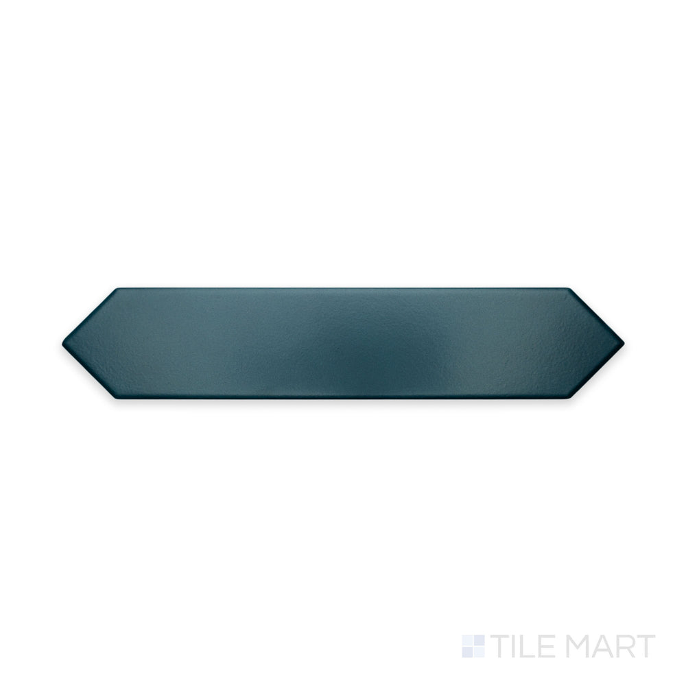 A focused close-up of Block Verde 2X10 Arrow Matte Ceramic highlights its earthy green shade with a unique arrow pattern, ideal for dynamic wall designs.