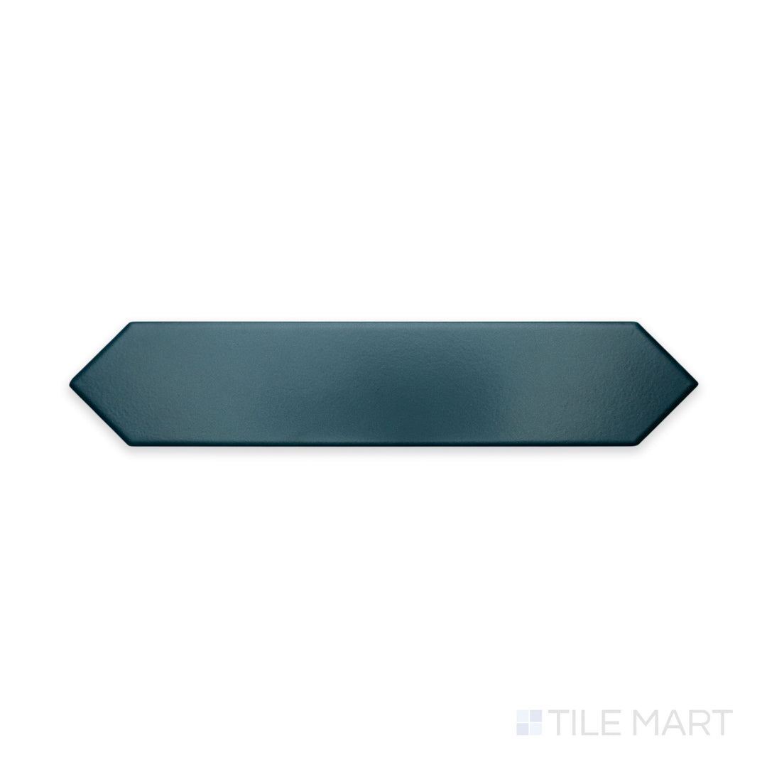 A focused close-up of Block Verde 2X10 Arrow Matte Ceramic highlights its earthy green shade with a unique arrow pattern, ideal for dynamic wall designs.