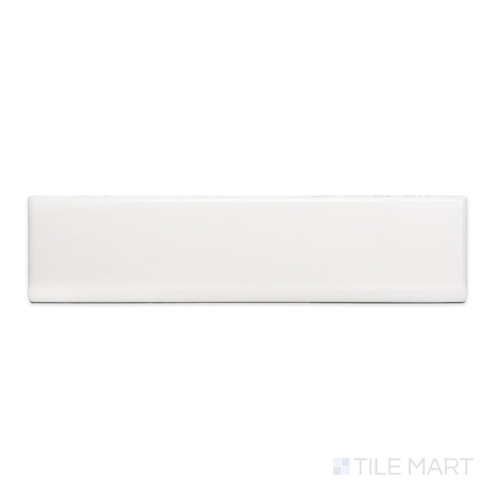 A flat-lay shot of Block Blanco 2x10 matte ceramic bullnose, highlighting its soft white tone and smooth, non-reflective finish.