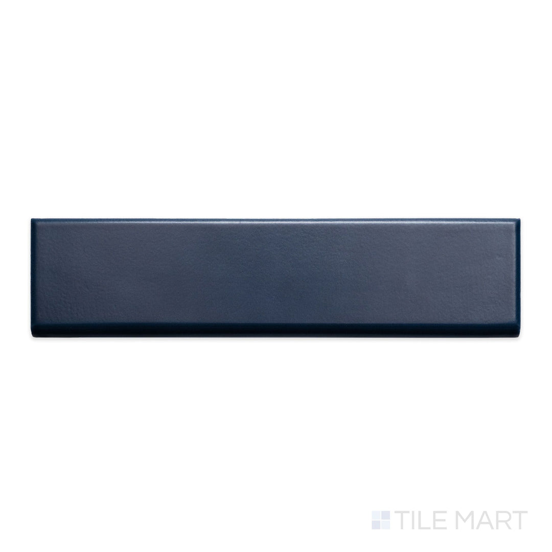 An overview of Block Azul 2x10 matte ceramic bullnose, featuring a muted blue shade with a velvety matte texture.