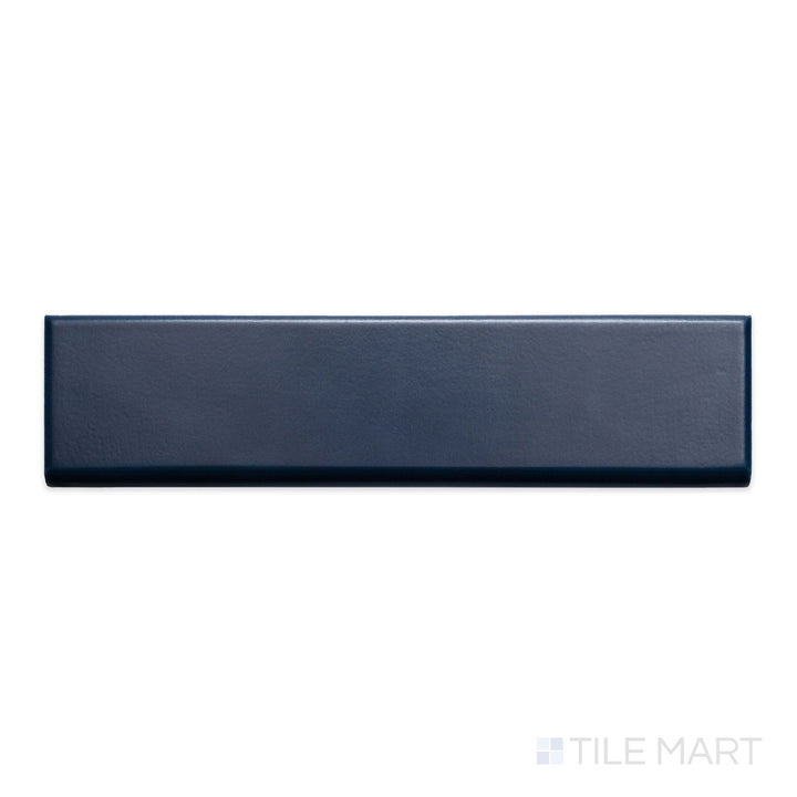 An overview of Block Azul 2x10 matte ceramic bullnose, featuring a muted blue shade with a velvety matte texture.