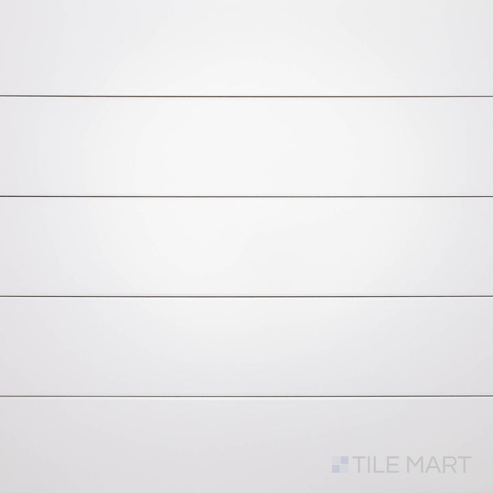 A top-down view of the Block Gris 4x24 inch matte glazed porcelain tile highlights its soft gray tone and smooth, non-reflective surface, ideal for a sophisticated, contemporary look.