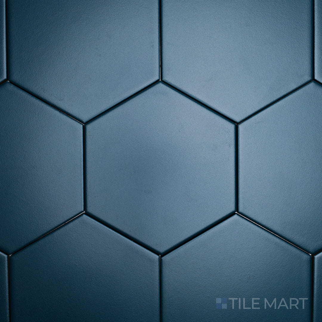 This overhead view of the Block Verde 6-inch hexagon matte glazed porcelain tile showcases its fresh green hue and structured hexagonal pattern, bringing an organic touch to interiors.