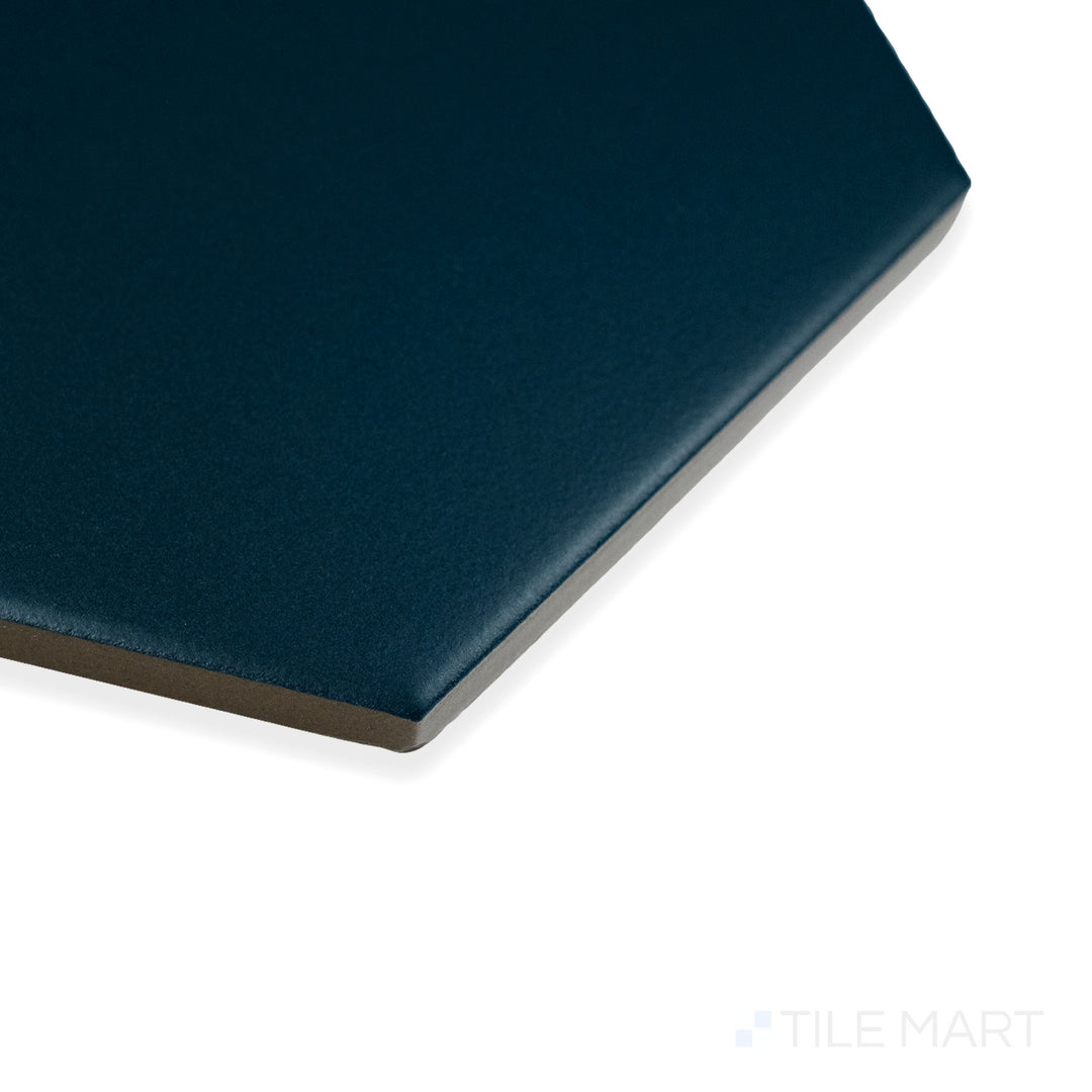 Angled perspective of Block Verde 6" hexagon matte glazed porcelain tile, featuring its fresh green shade, non-glossy finish, and well-defined corner junction.