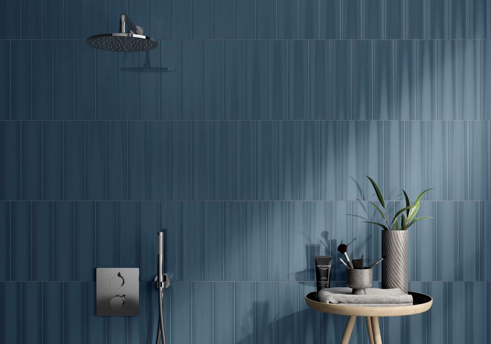 Make a bold statement with CC Cosmos Petrol 3X12 bright ceramic tile, where deep blue-green hues create an atmosphere of depth, sophistication, and effortless style.