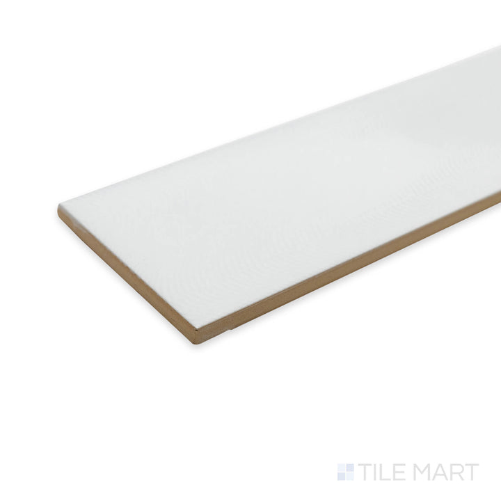 Corner-focused image of Cc Cosmos White Ice 3X12 bright ceramic tile, emphasizing its crisp white color, glossy surface, and structured tile meeting point.