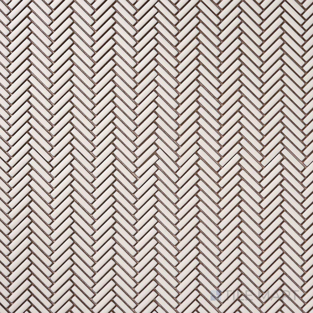 Seen from above, the Cc Mosaics Plus Antique White Herringbone bright glazed porcelain tile displays its warm white hue and intricate herringbone pattern, perfect for timeless elegance.