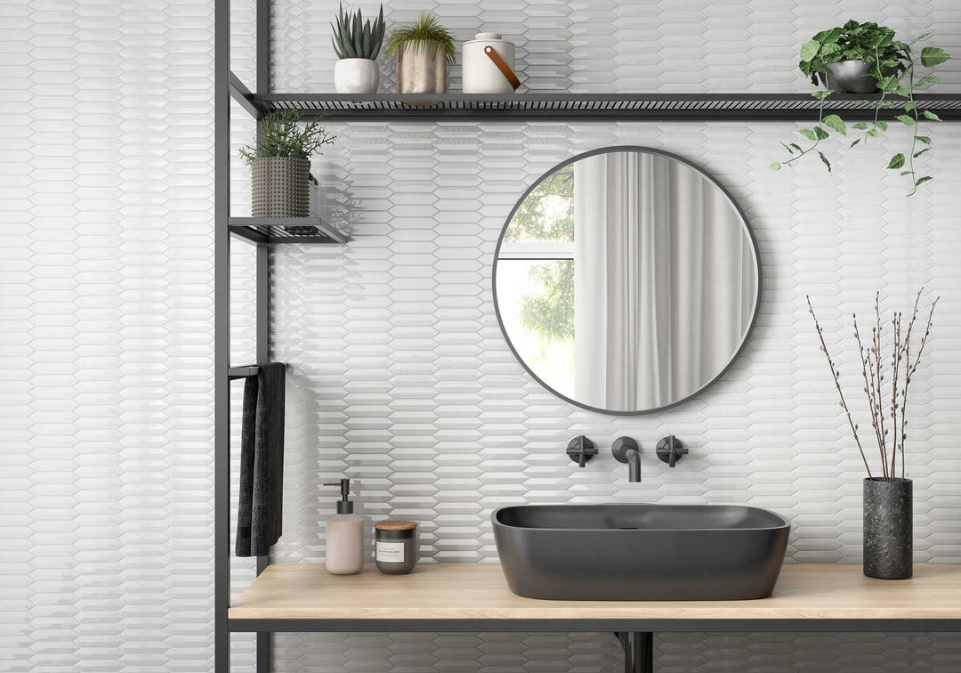 Elevate walls with CC Mosaics Plus White 1X4 3D Picket matte glazed porcelain, a dynamic and textural design that brings contemporary elegance to any setting.