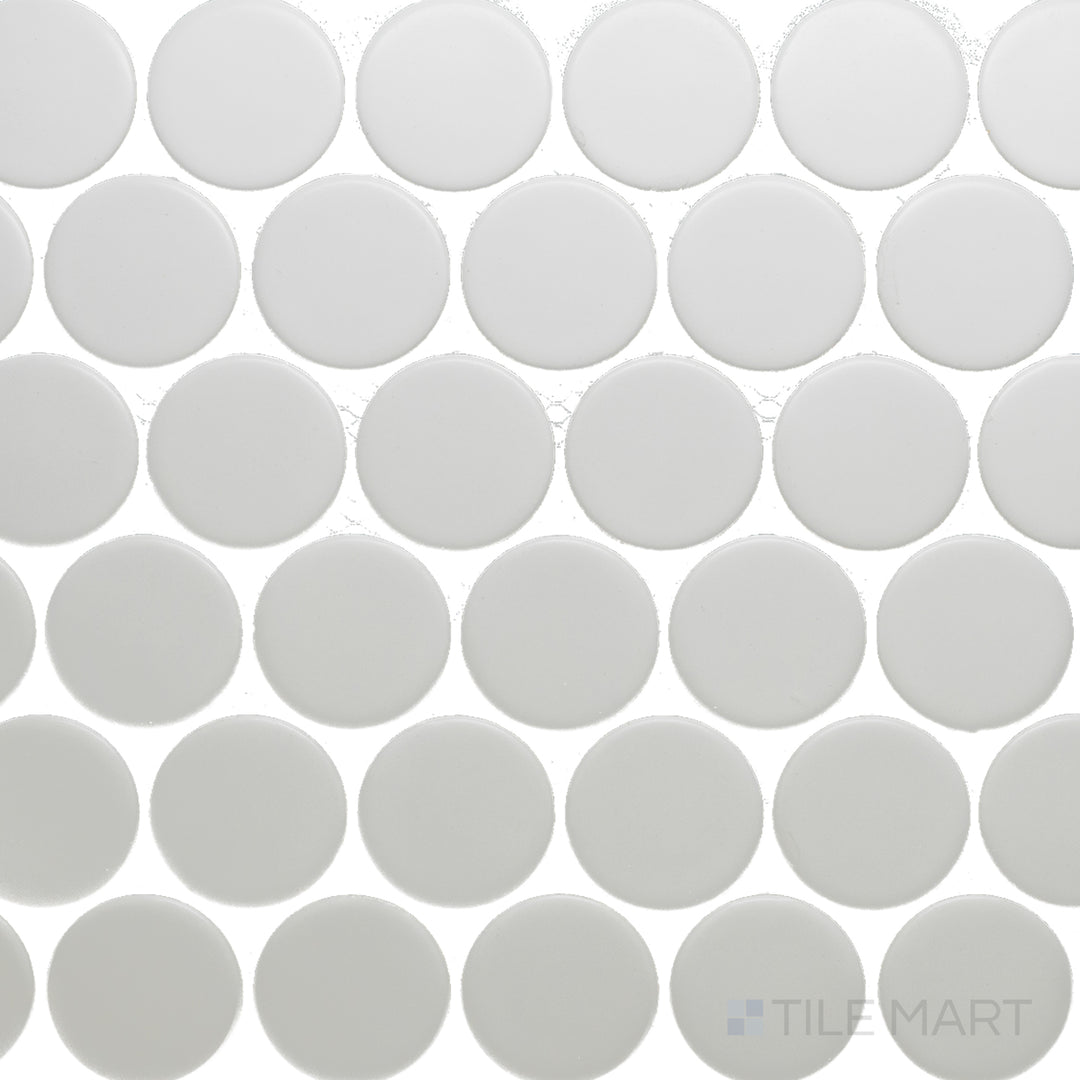 This overhead view of the Cc Mosaics Plus White 2-inch Dots matte glazed porcelain tile presents its crisp white hue and soft matte texture, ideal for a subtle yet stylish effect.