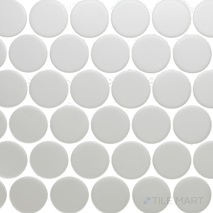 This overhead view of the Cc Mosaics Plus White 2-inch Dots matte glazed porcelain tile presents its crisp white hue and soft matte texture, ideal for a subtle yet stylish effect.
