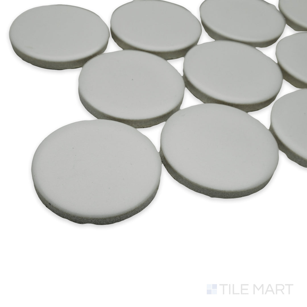 Angled perspective of Cc Mosaics Plus White 2" dots matte glazed porcelain tile, featuring its uniform dot layout, soft matte finish, and seamless corner transition.