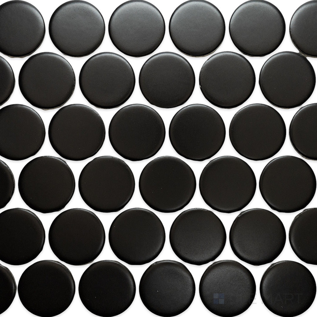 An overhead view of the Cc Mosaics Plus Black 2-inch Dots matte glazed porcelain tile showcases its bold black color and smooth matte texture, perfect for striking monochrome designs.