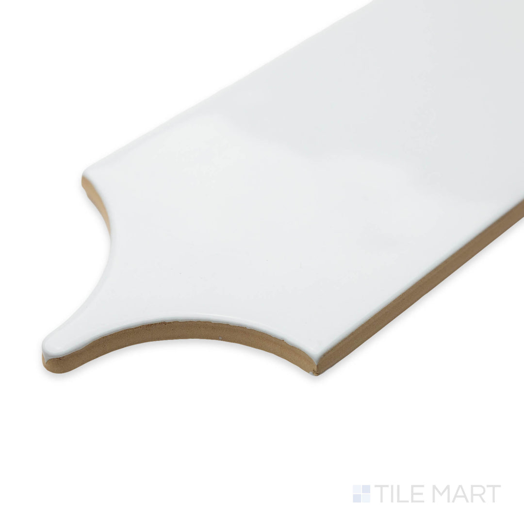 Angled view of Feathers White Ice 3X12 bright ceramic tile, showcasing its crisp white hue, polished surface, and sharp corner definition.