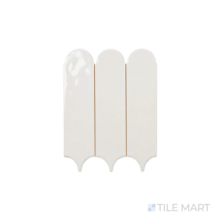 An intricate close-up of Feathers Wool 3X12 Bright Ceramic displays its neutral, warm beige tone with a glossy glaze, offering a soft and inviting aesthetic.