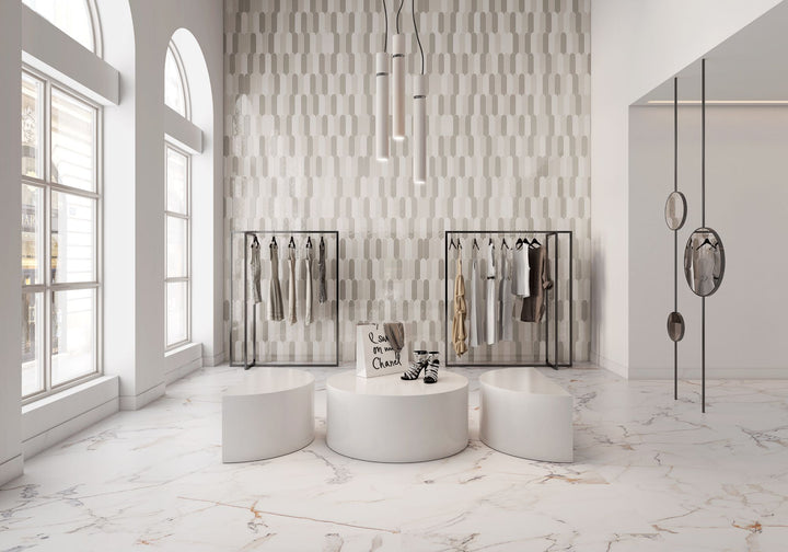 A warm, wool-toned ceramic tile with a glossy finish, Feathers Wool 3x12 creates a soft yet polished aesthetic.