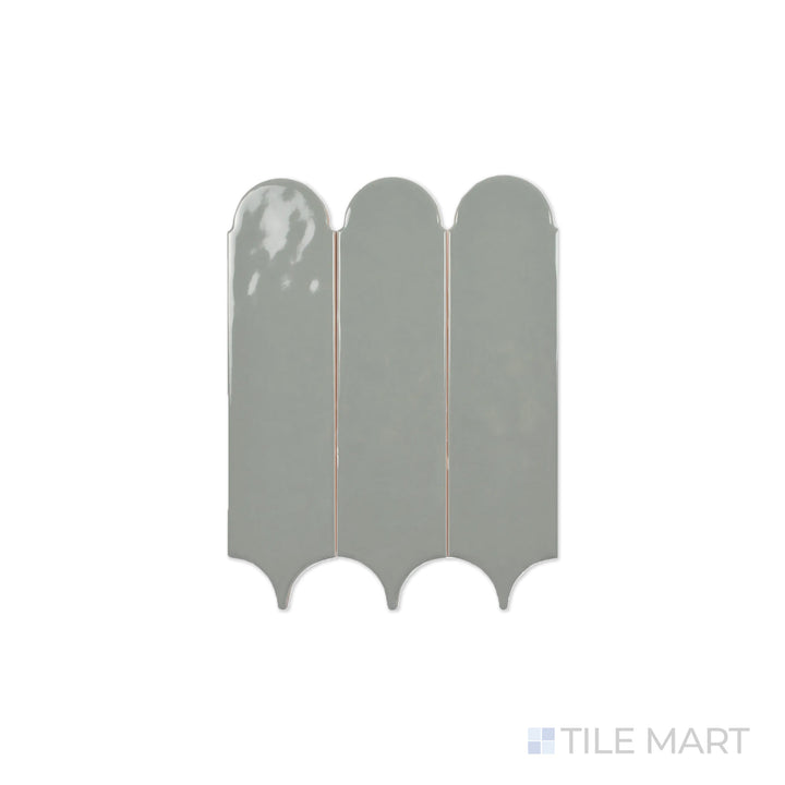 A macro perspective of Feathers Grass 3X12 Bright Ceramic showcases its nature-inspired green tone and high-gloss texture, adding freshness to any setting.