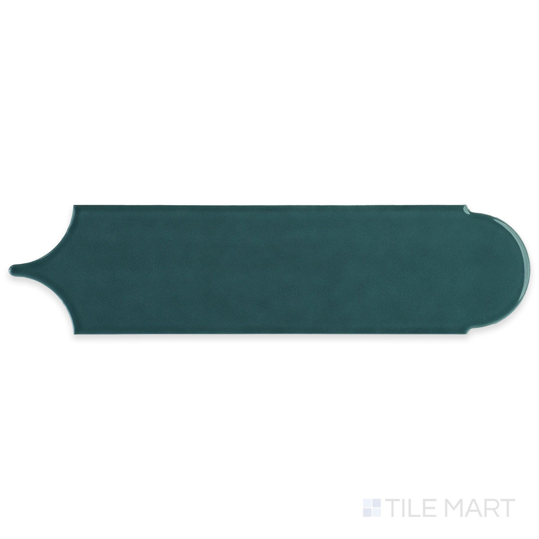 Top-down view of Feathers Seagrass 3x12 Bright ceramic tile, capturing the full feather-shaped tile in a vibrant sea-green glossy finish.