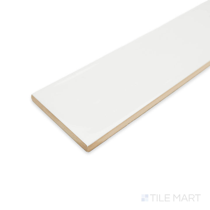 Angled corner shot of Flow White 3X12 bright ceramic tile, featuring its pure white color, sleek polished finish, and structured edge transition.