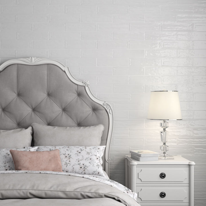 Transform interiors with the cool elegance of Flow Frost 3X12 bright ceramic tile, evoking the serene beauty of winter landscapes.