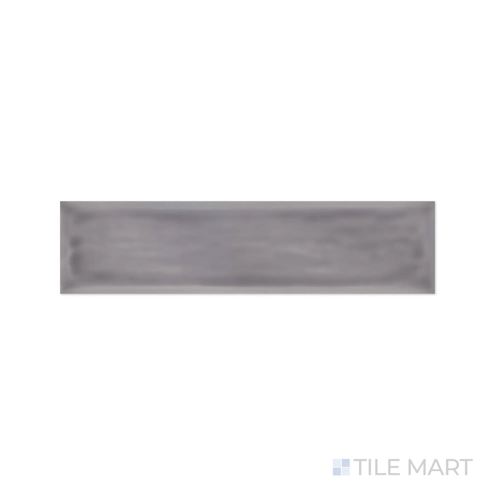 A refined close-up of Flow Lavender 3X12 Bright Ceramic showcases its soft lavender shade and luminous glossy finish, adding a serene ambiance to walls.