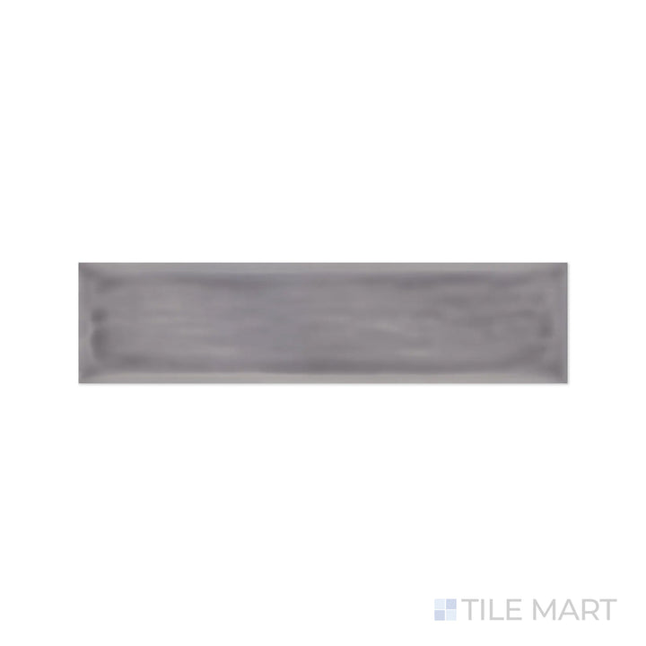 A refined close-up of Flow Lavender 3X12 Bright Ceramic showcases its soft lavender shade and luminous glossy finish, adding a serene ambiance to walls.