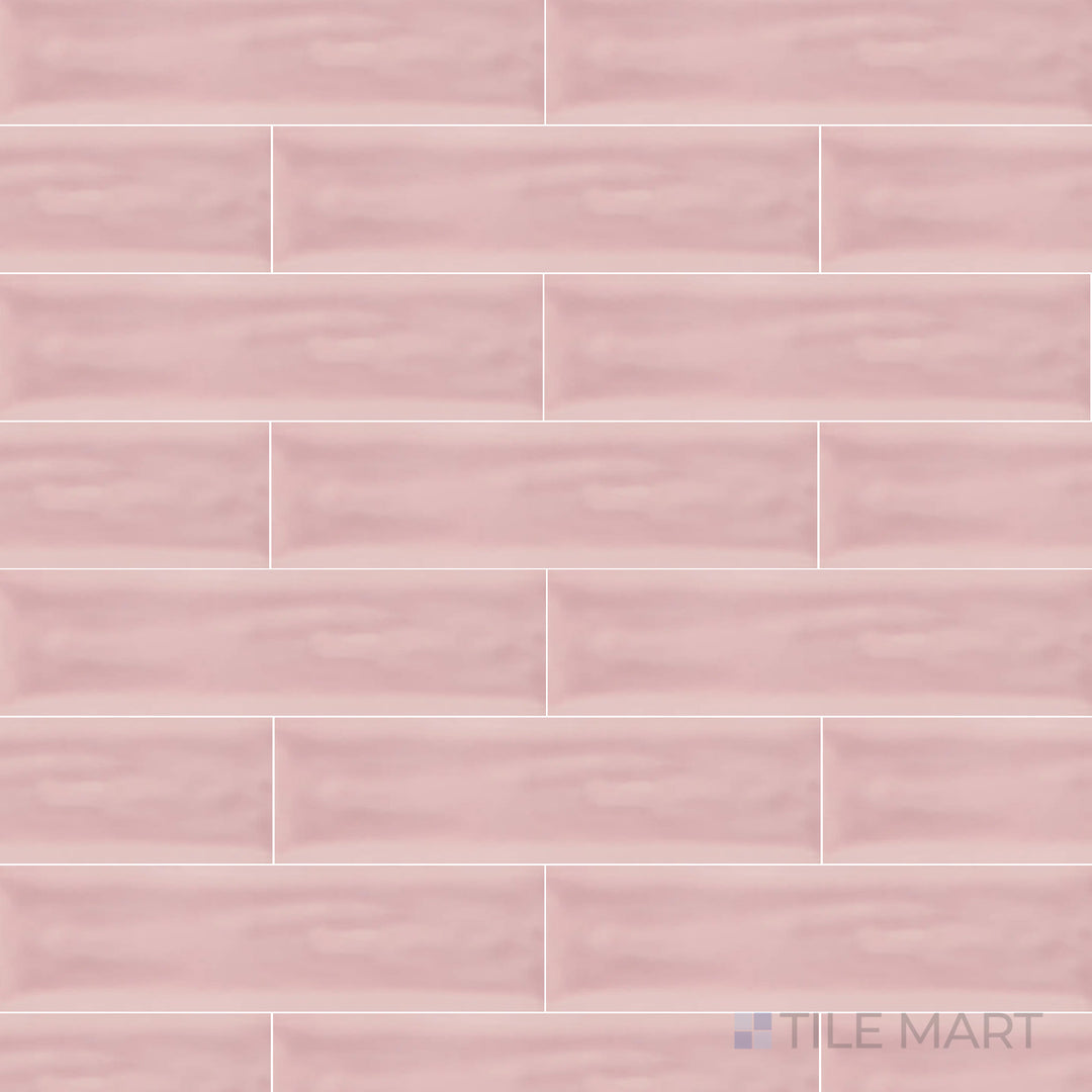 An overhead view of the Flow Velvet Pink 3x12 inch bright ceramic tile showcases its soft pink hue and glossy finish, adding a touch of warmth and elegance to interiors.