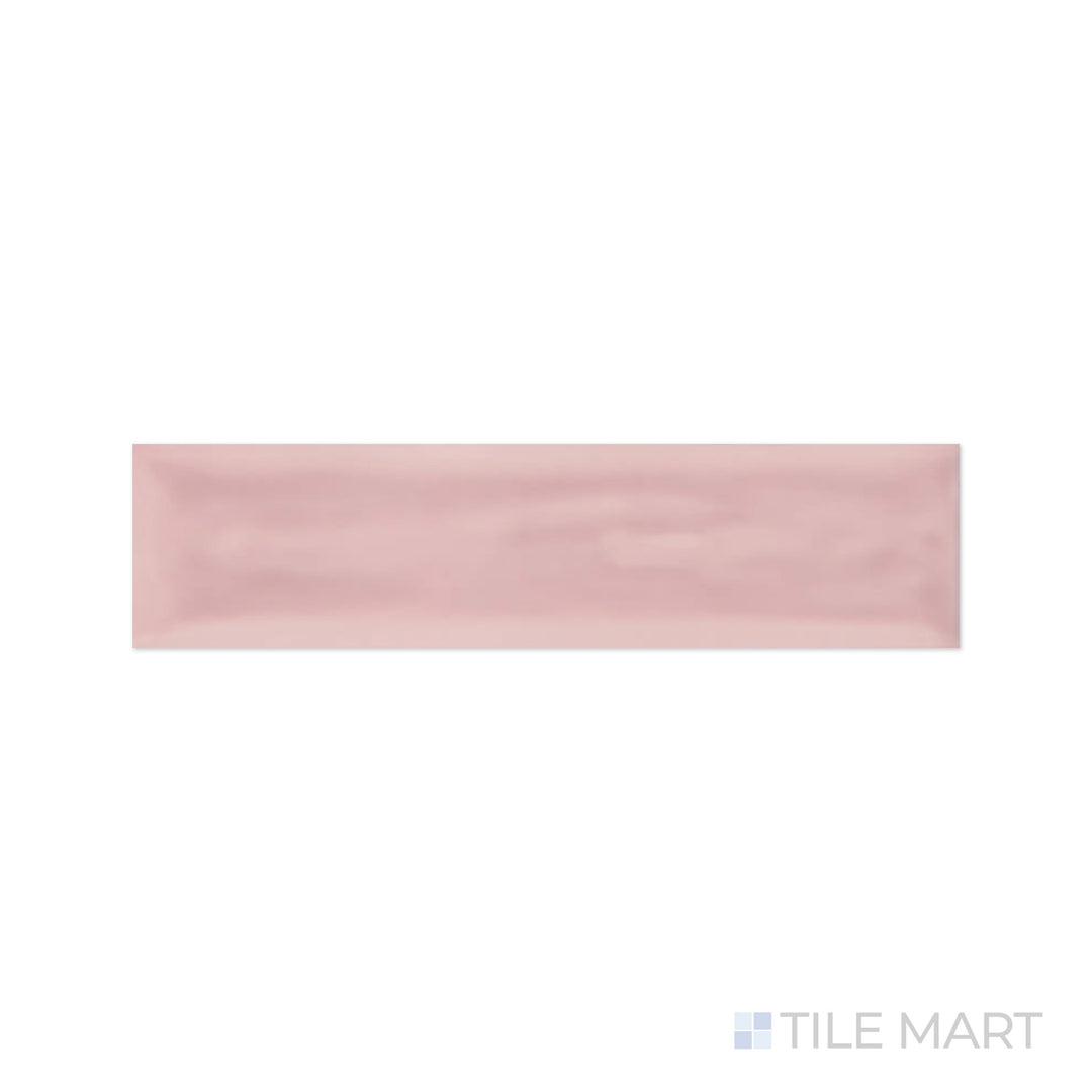 A macro view of Flow Velvet Pink 3X12 Bright Ceramic captures its muted pink tone with a glossy texture, offering a chic and stylish touch to wall designs.