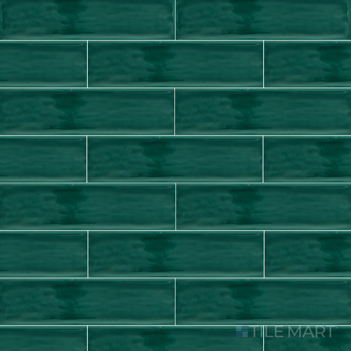 An overhead view of the Flow Living Green 3x12 inch bright ceramic tile captures its vibrant green hue and glossy surface, bringing a lively and organic feel to spaces.